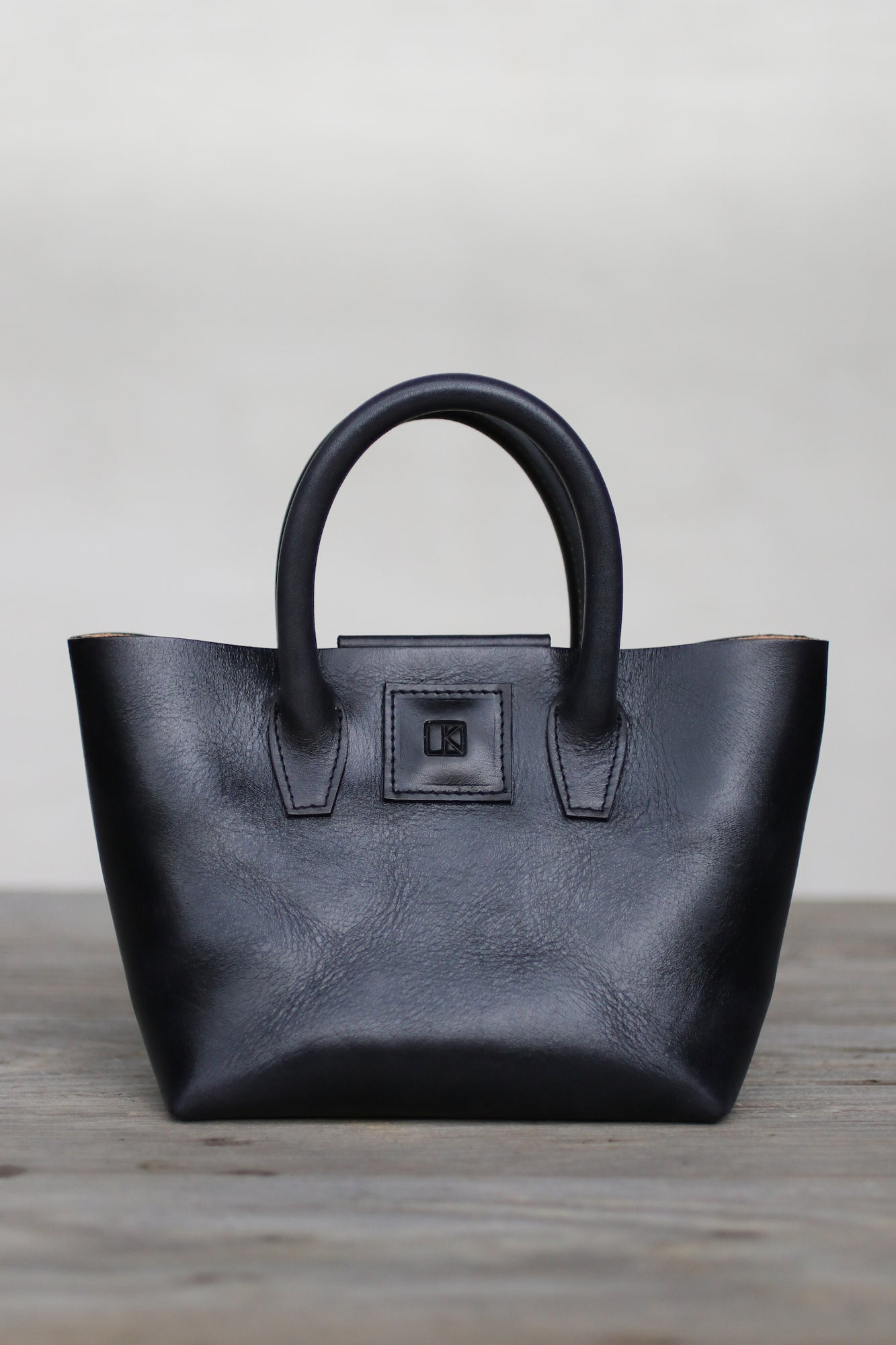 black leather mini tote bag