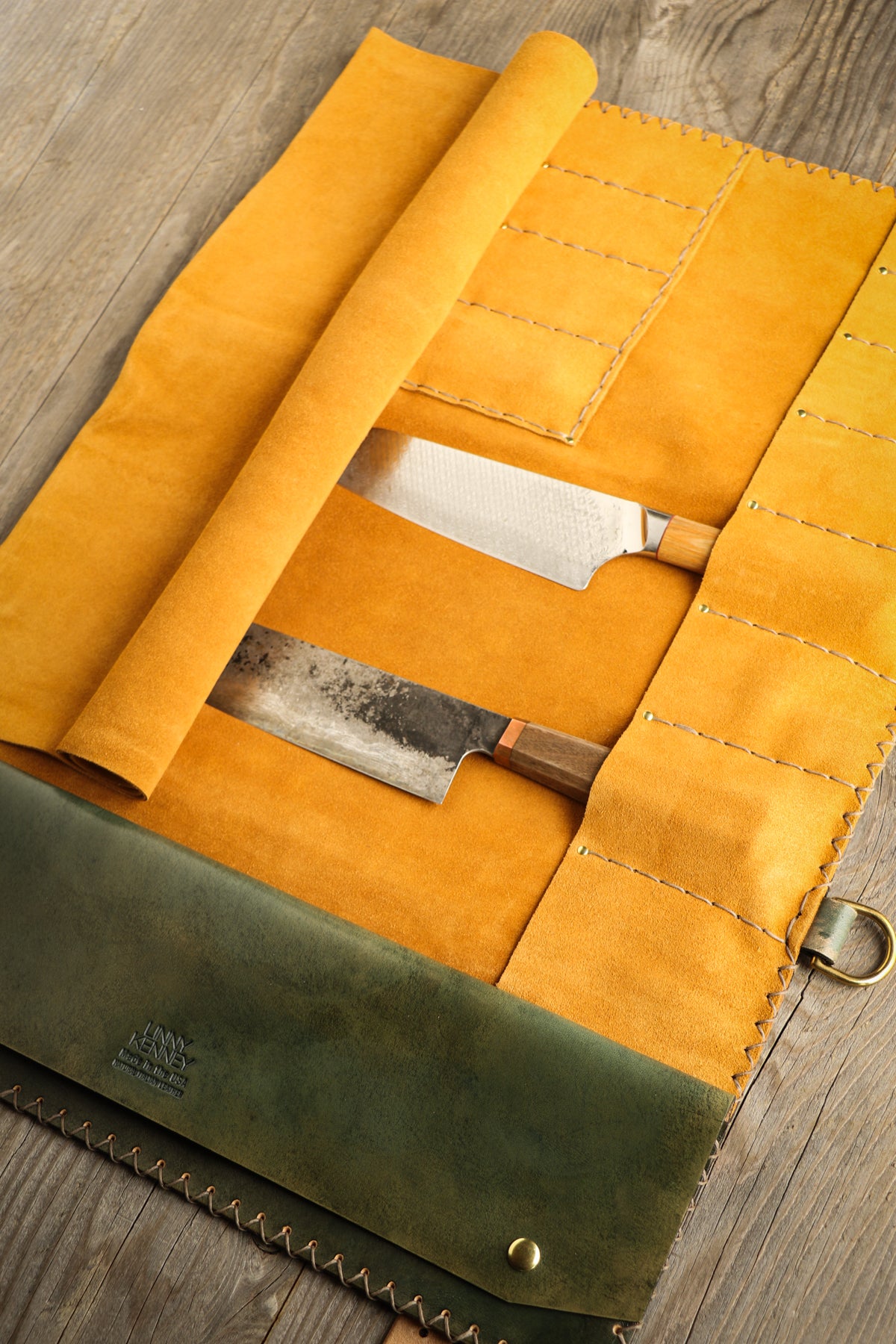 green and gold leather knife roll