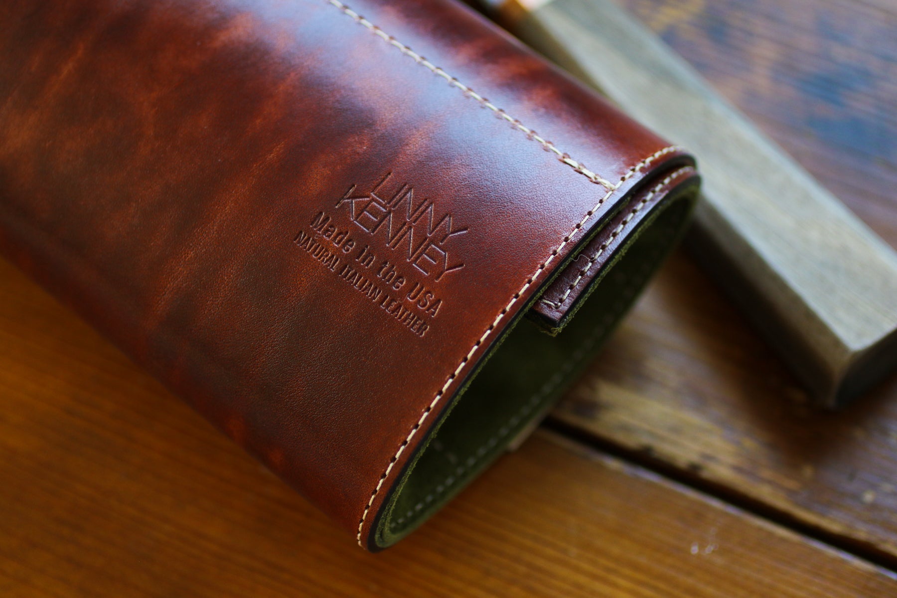 green-and-burgandy-leather-knife-roll