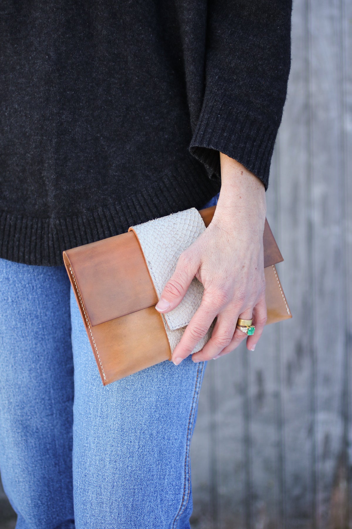 salmon and leather clutch