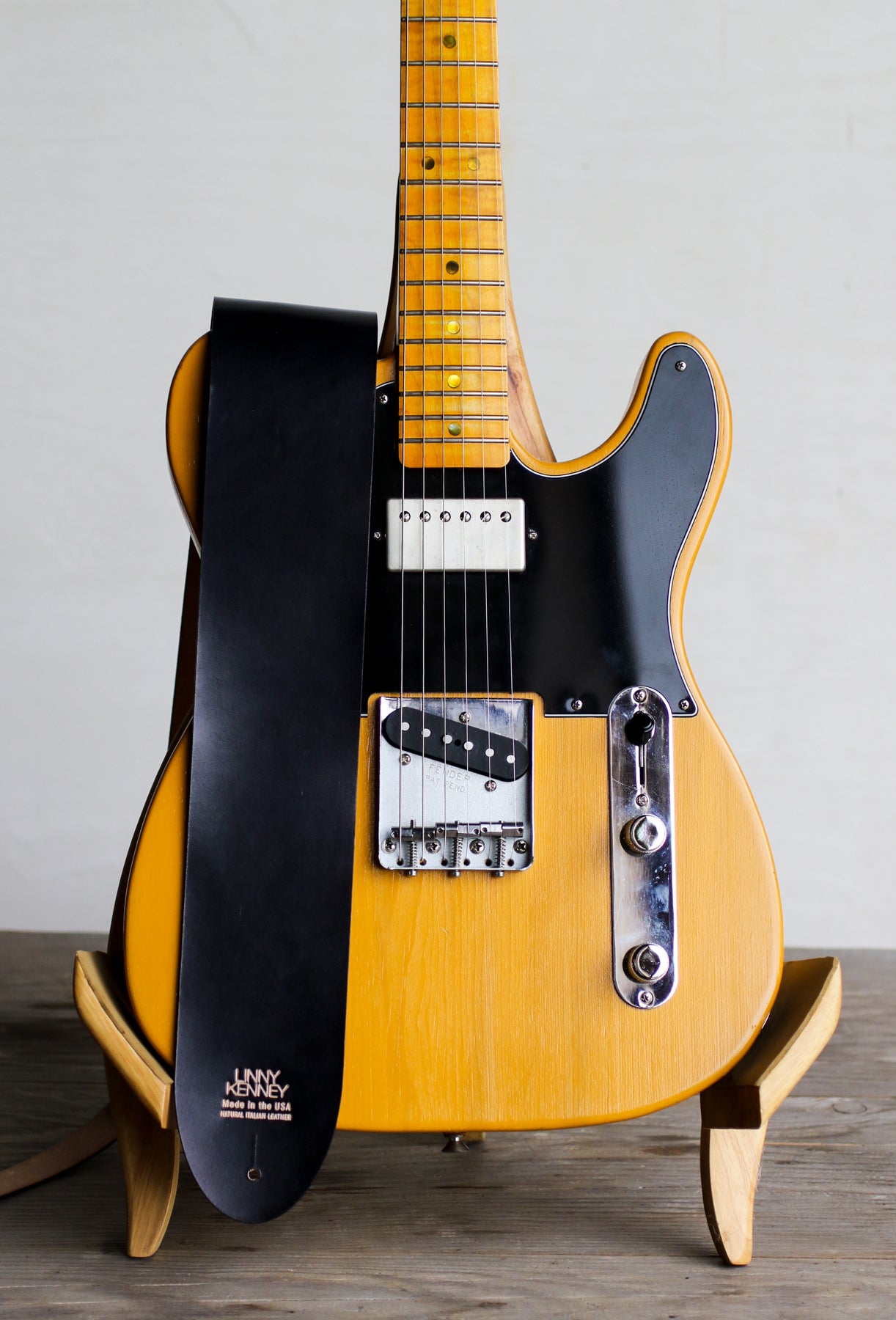 black leather wide guitar strap